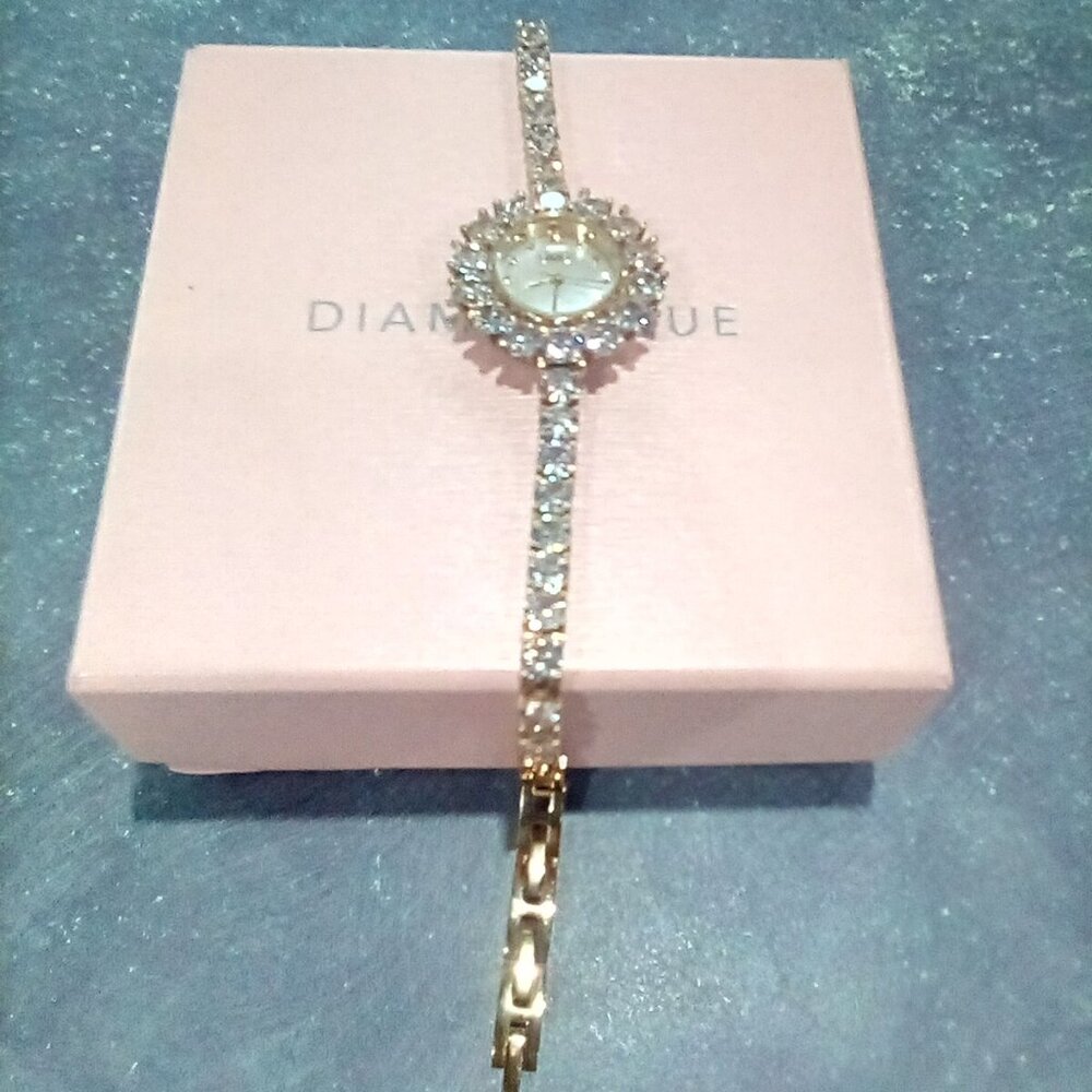 Women's Crystal Tennis Bracelet Watch (in Goldtone)